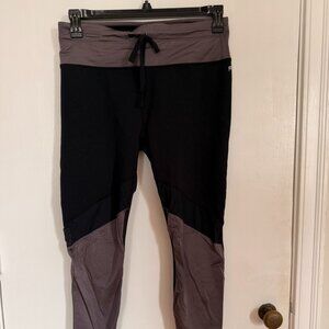 Fabletics XL Capri-Length PowerHold Leggings with Reflective Silver and Mesh